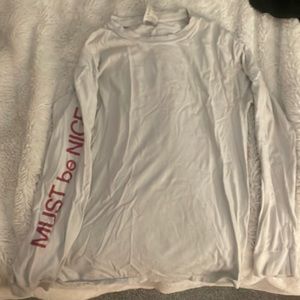 white Ripndip shirt, great thick quality. slight cracks in pictures on shirt.